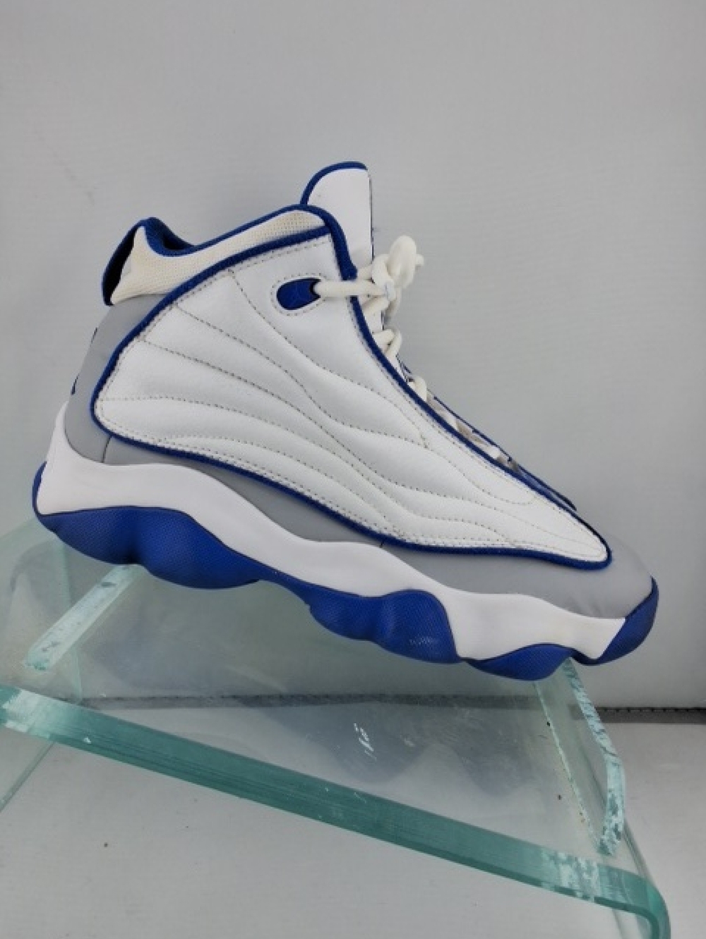 Jordan High-Top Sneaker in White and Royal Blue